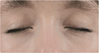 a close up of a person's eyes