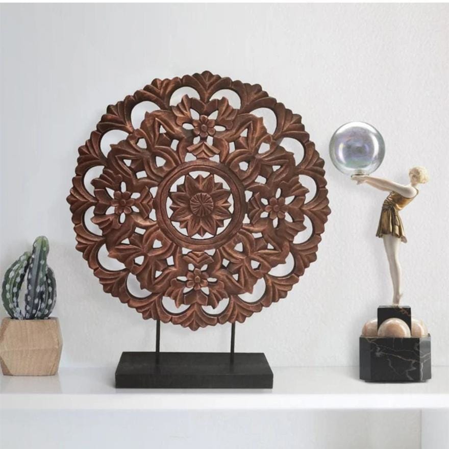 Intricately Carved Floral Wheel Sculpture