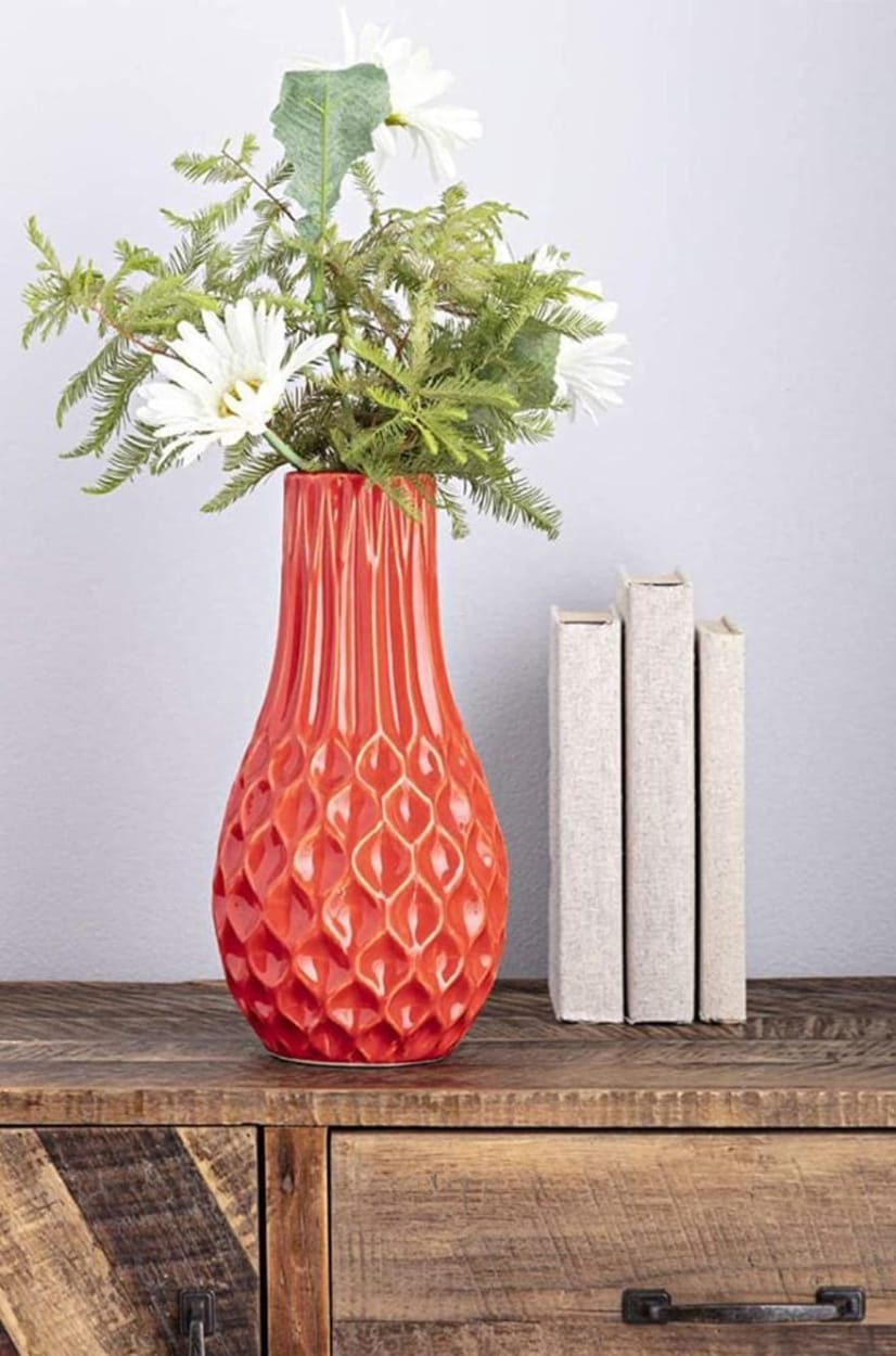 Ceramic Vase with Embossed Surface and Rounded Bottom Base