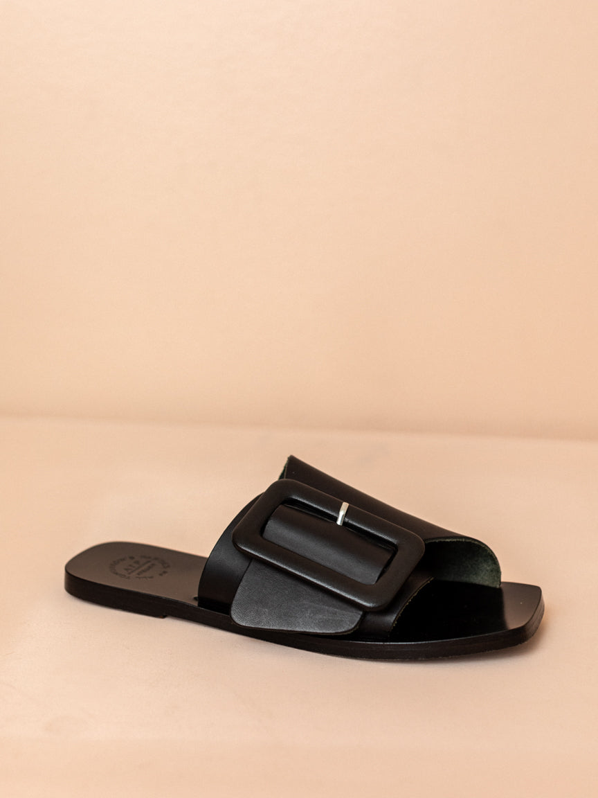 black flat slip on sandals