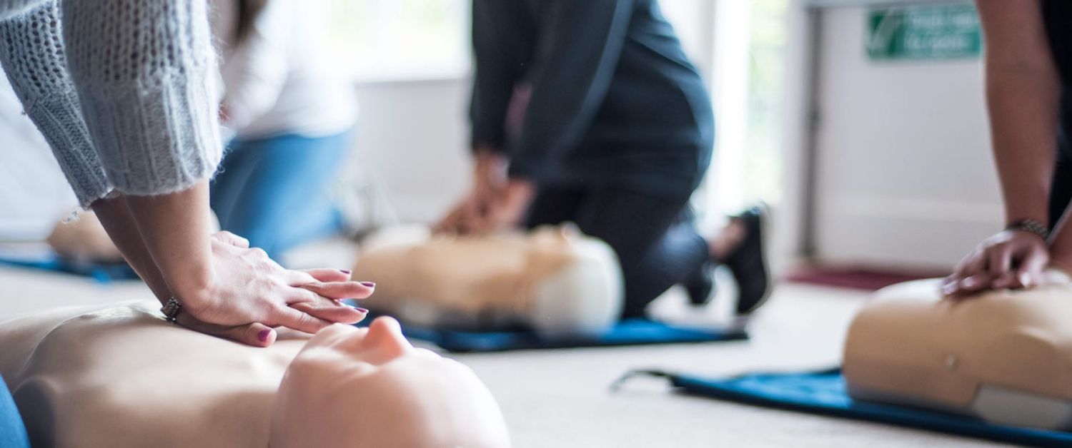 People learning first aid and cpr