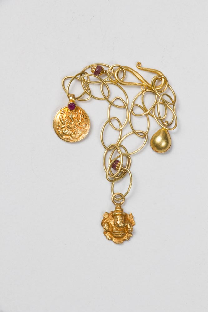 18 KT Gold Charm Bracelet