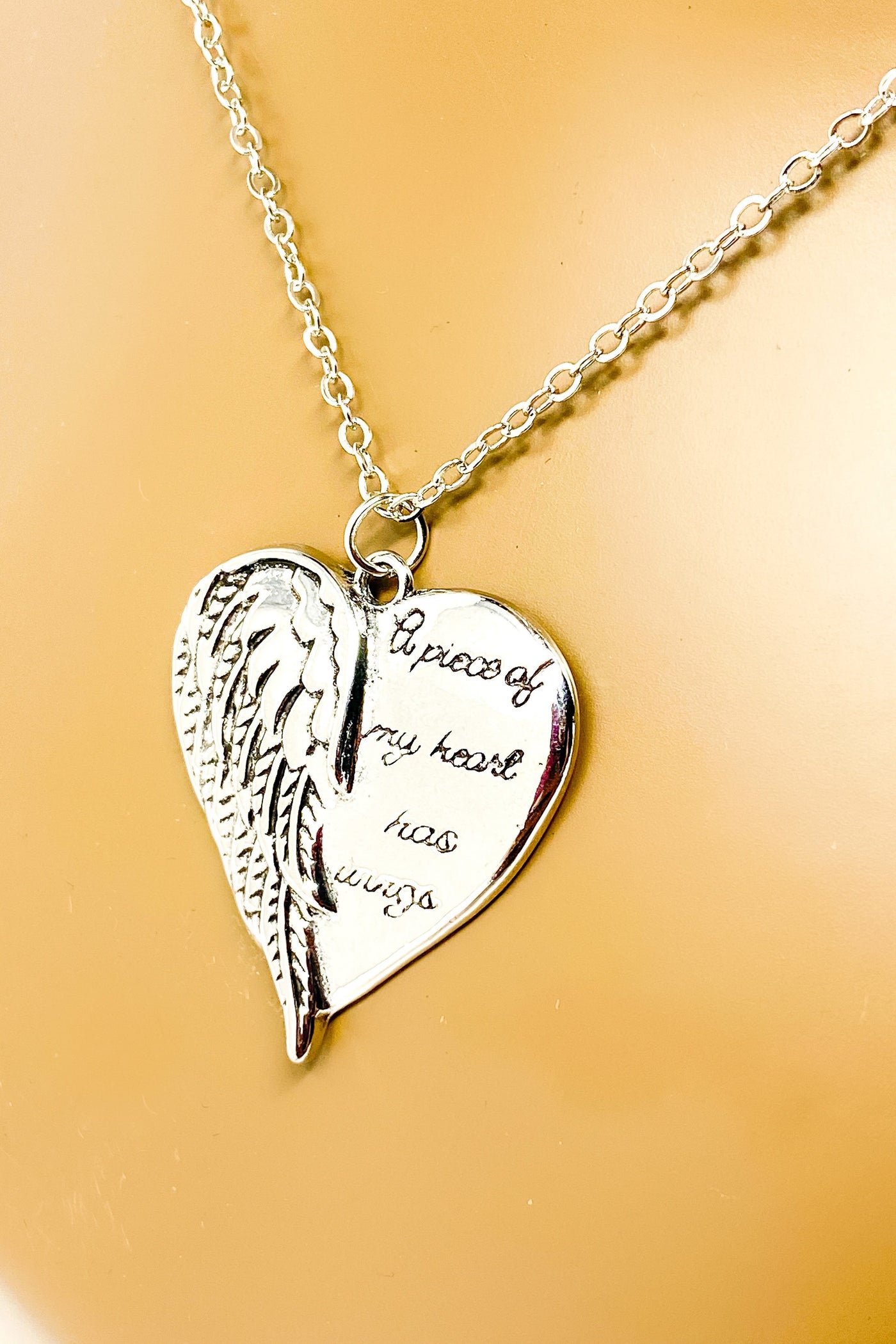 a piece of my heart has wings necklace