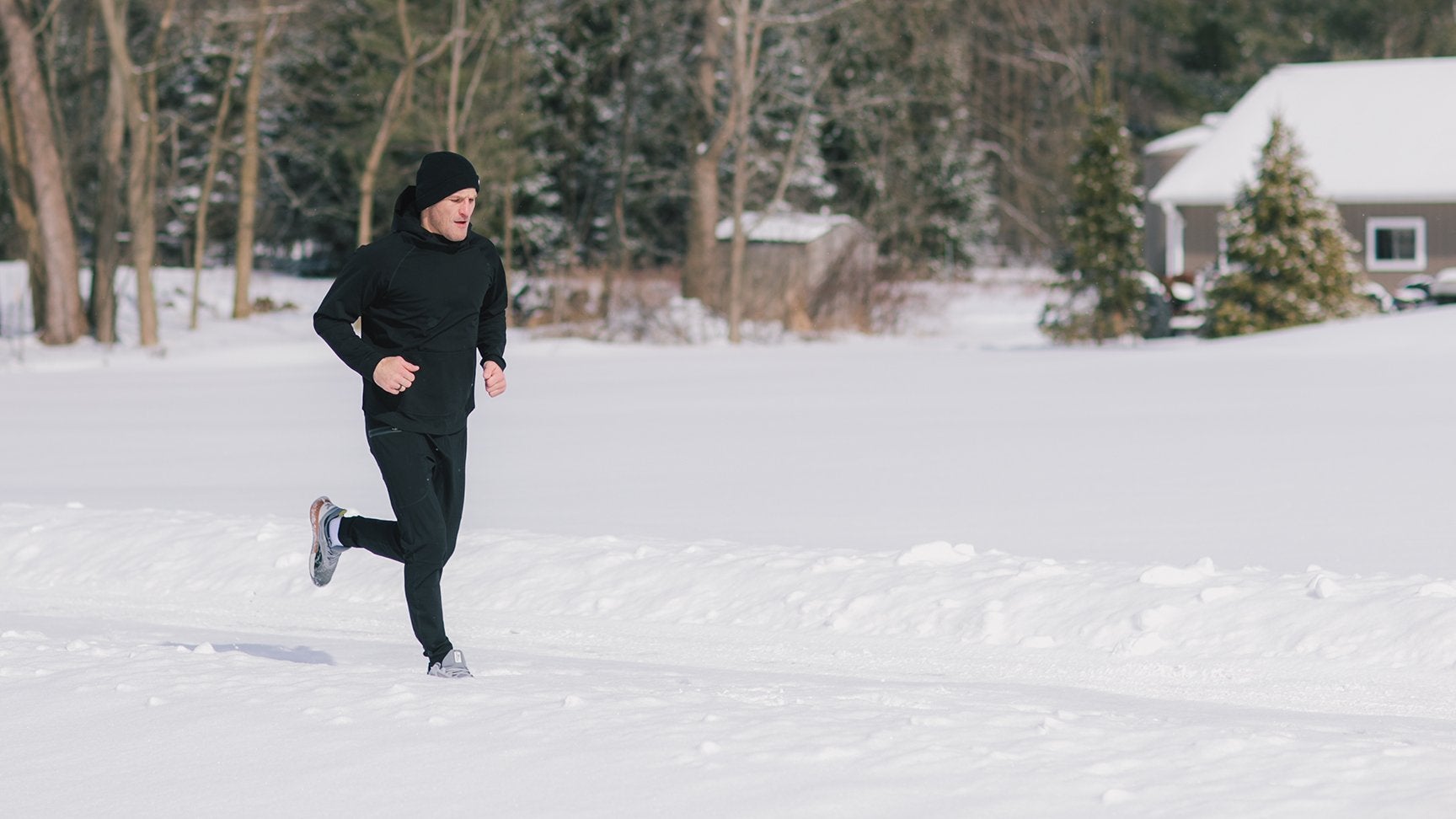 Man running in snow