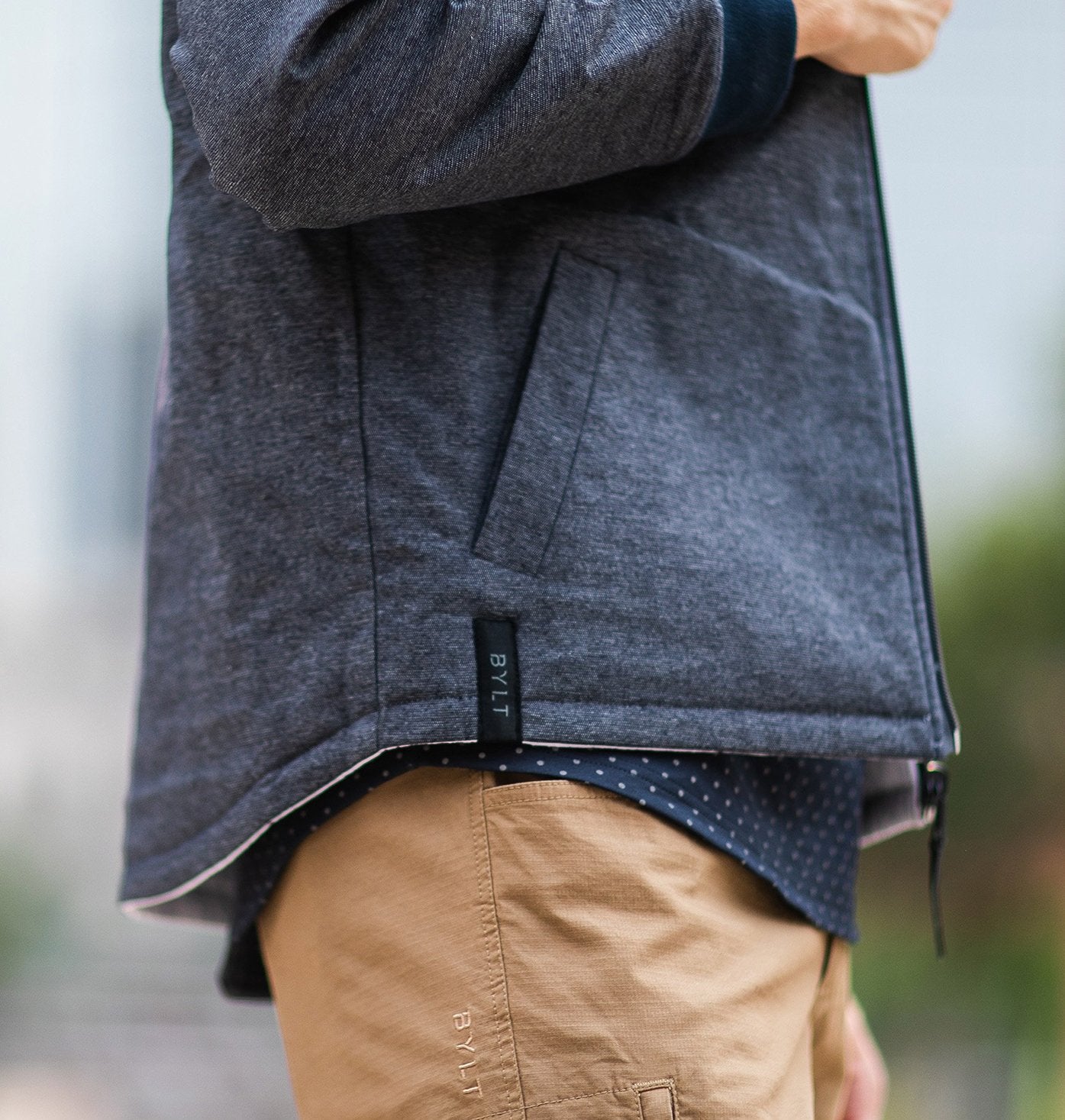 Man with backpack crossing the street