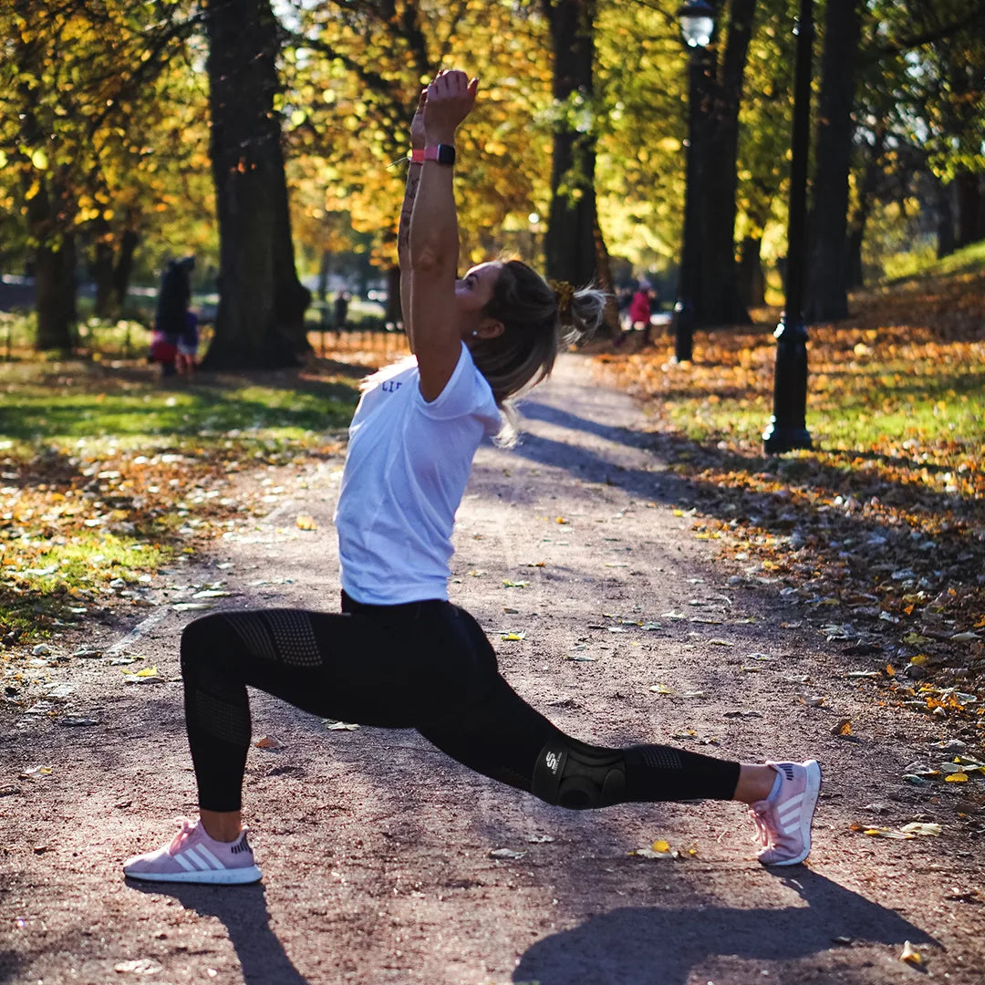 Adjustable knee brace with straps for support and pain relief, ideal for injury recovery and joint stability.