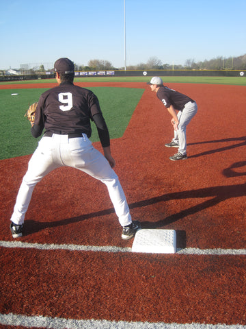 2 baseball players on baseball field