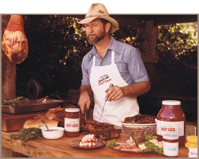 J. Lee Roy, himself, givin' a wink and carvin' up some barbeque
