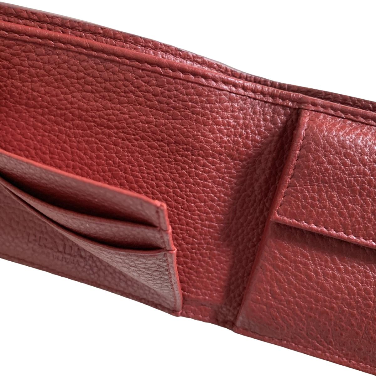 Prada Mens Debossed Logo Rubino Red Vitello Grain Bifold Wallet 2MO003