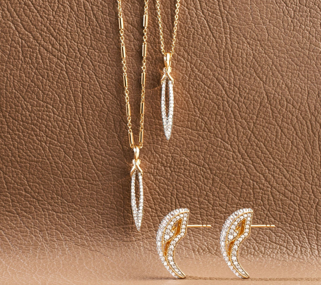 Stiletto pendants and talon earrings in rose gold