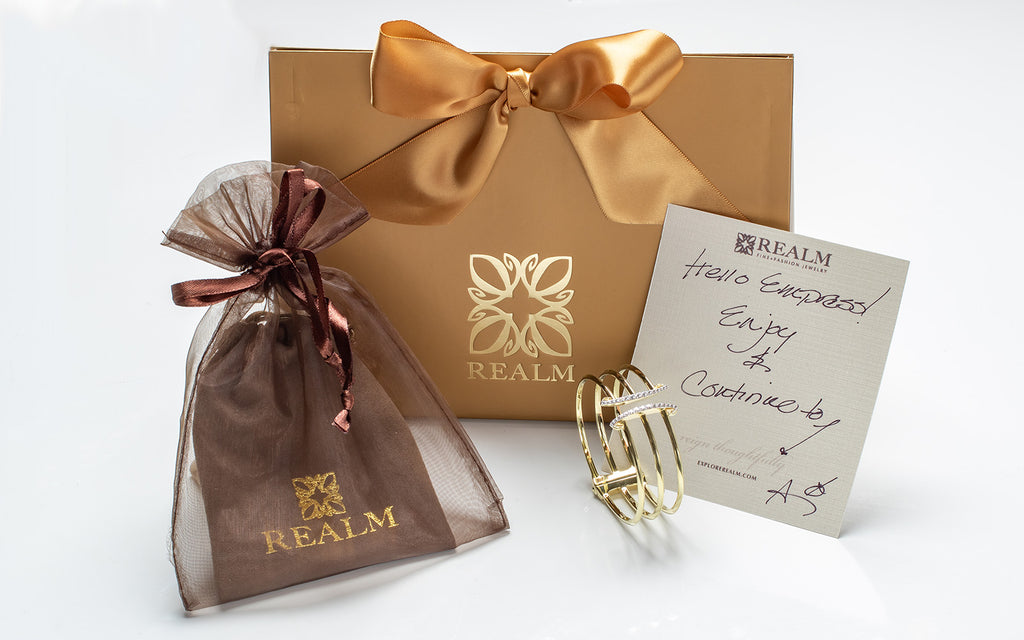 luxe complimentary gift packaging from REALM Fine + Fashion Jewelry