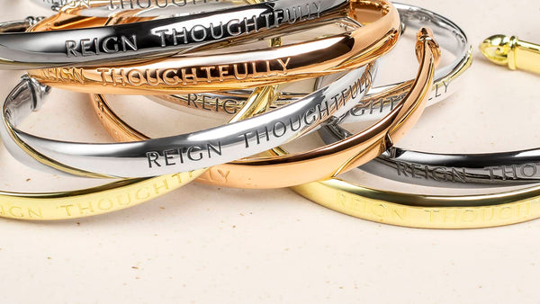 Reign Thoughtfully Cuffs in four precious metal Shades of REALM