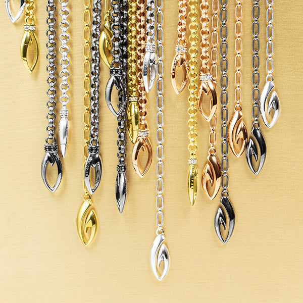 array of Coronet necklaces in four precious metals