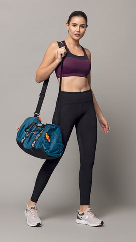 Model Wearing amante Sports Bra and Tights