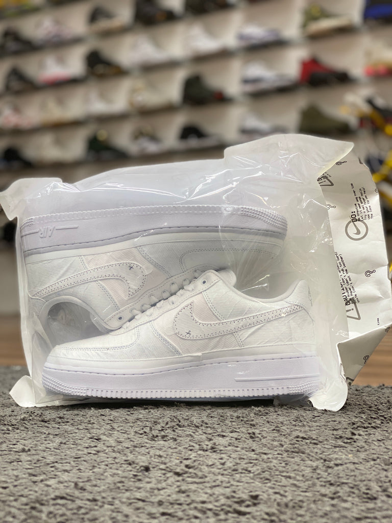 white ripped air force 1