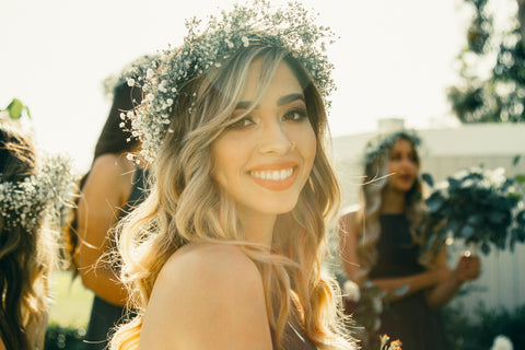 a bride with a flower crown on her head