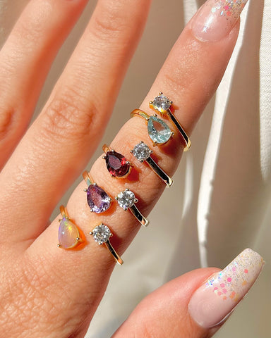 Make a fashionable statement with our unique gemstone rings