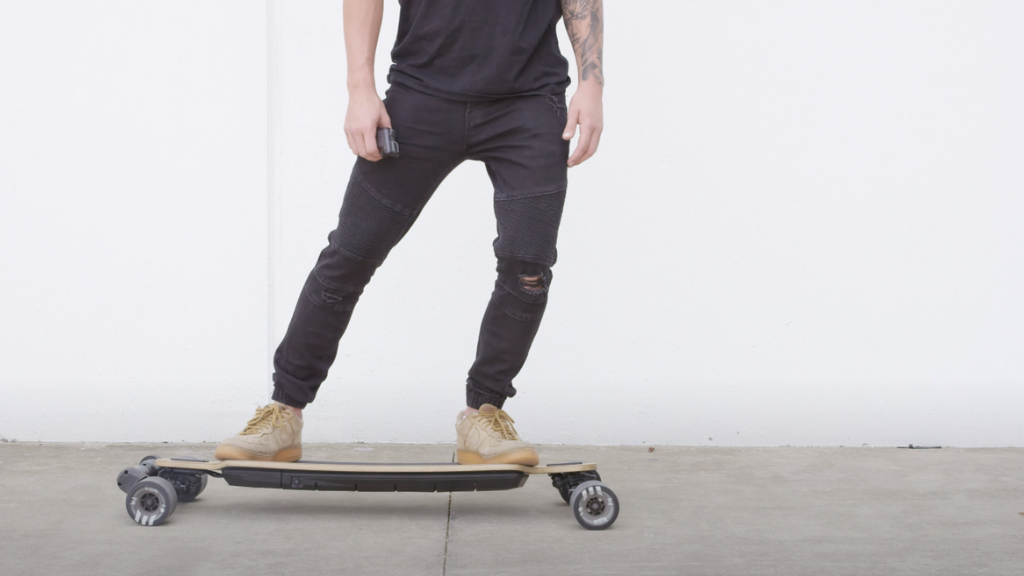 riding an electric skateboard