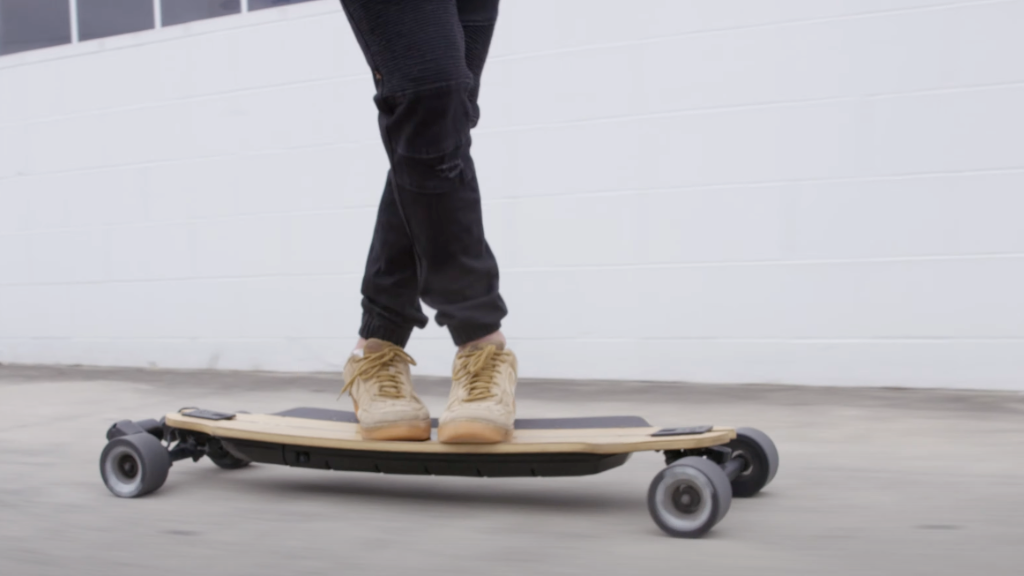 riding an electric skateboard