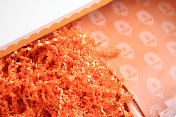 orange branded packaging by Studio Vincent