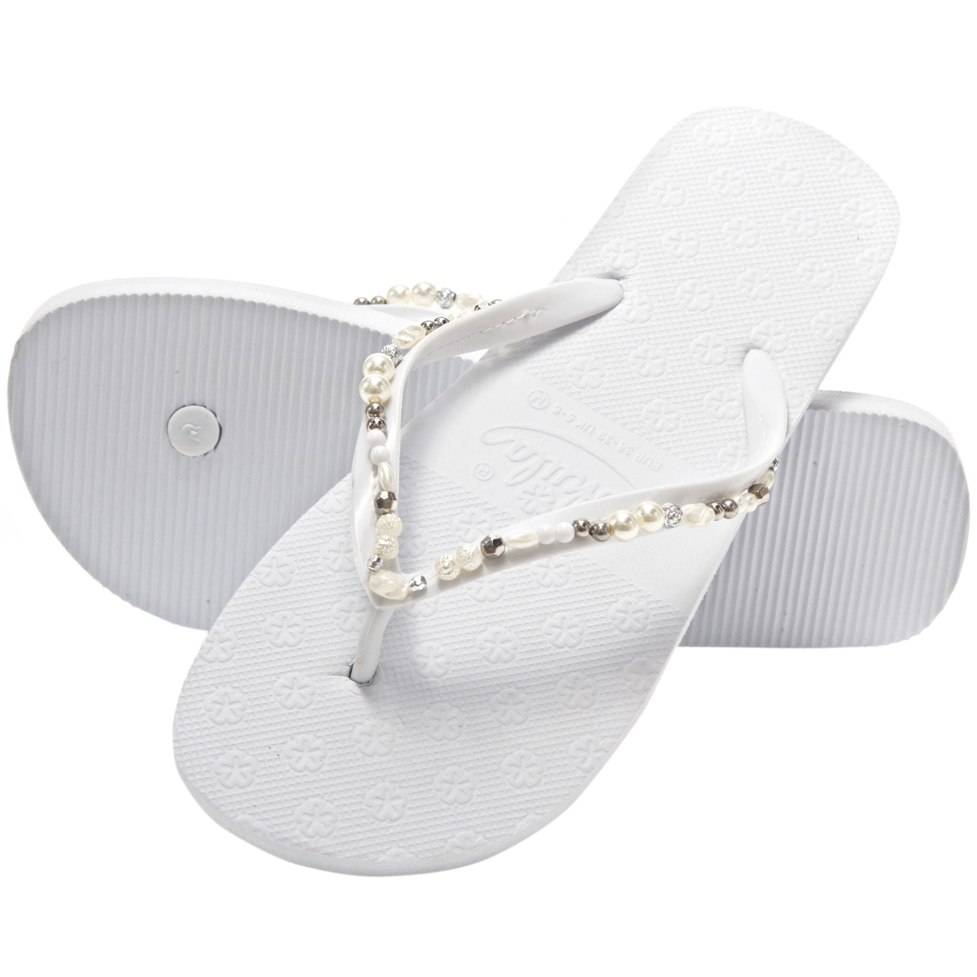 white pearl flip flops