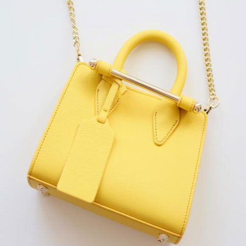 yellow shoulder bag