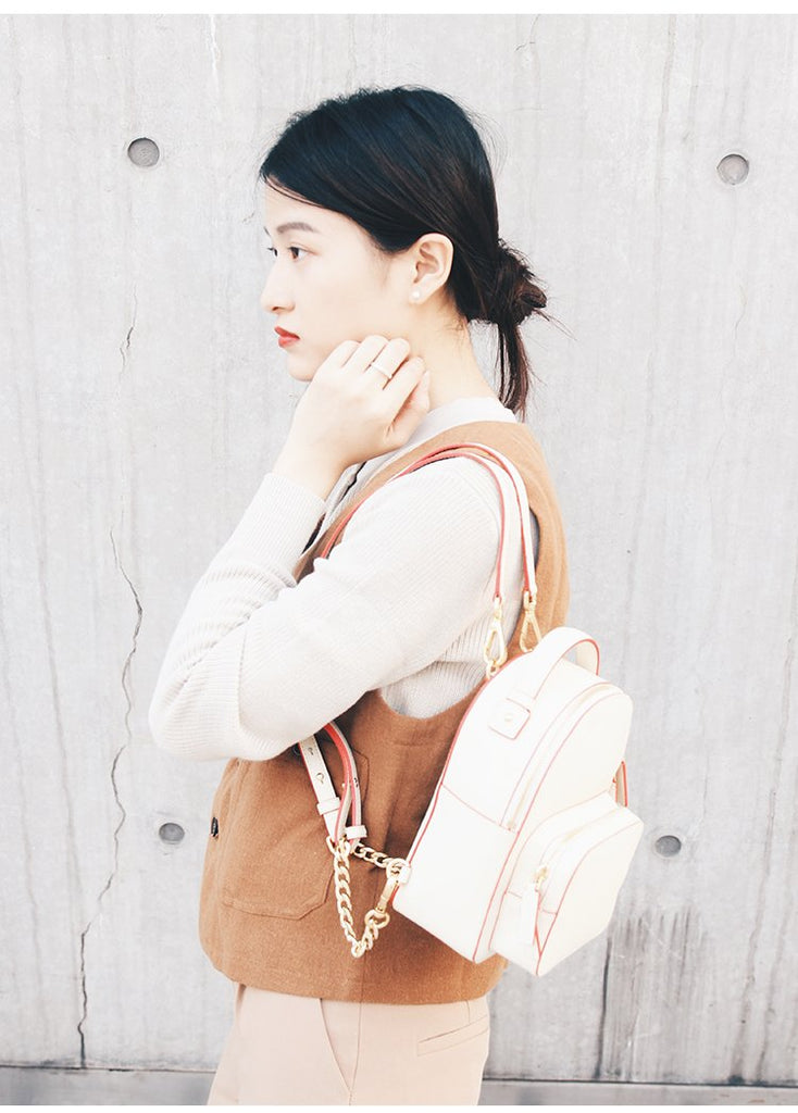 white leather backpacks