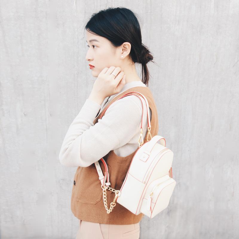 white leather backpack