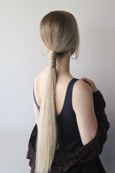 chic, sleek low ponytail platinum lockz