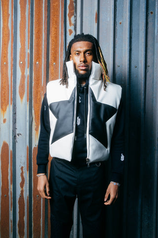 Fulham player Alex Iwobi in an Only the Blind hoodie at a photoshoot