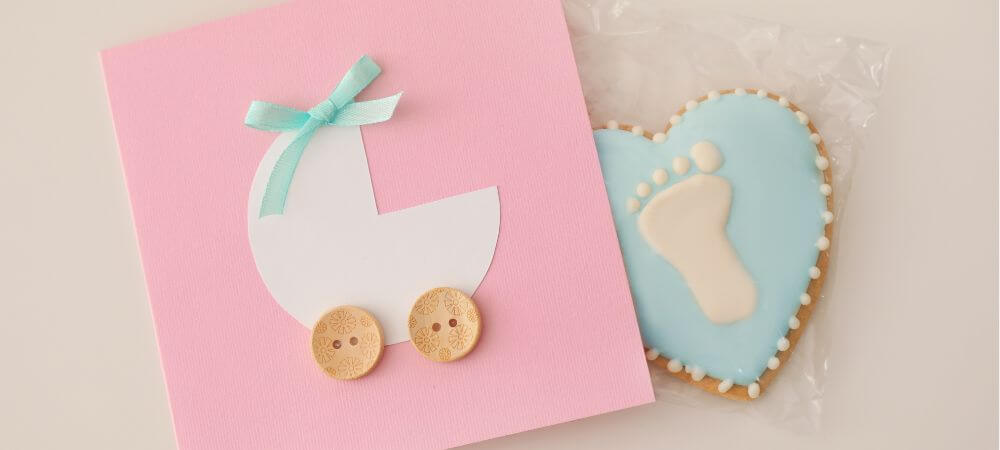 Baby Cards with stroller and heart-shaped Blue cookie.