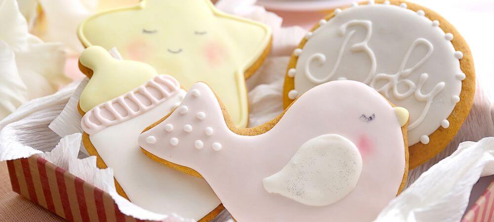 Baby Shower Cookies in a shape of birds and flask.