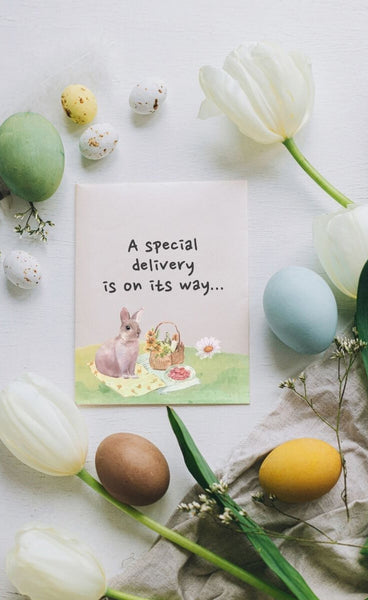 Easter card with tulips and eggs hints at a baby's arrival.