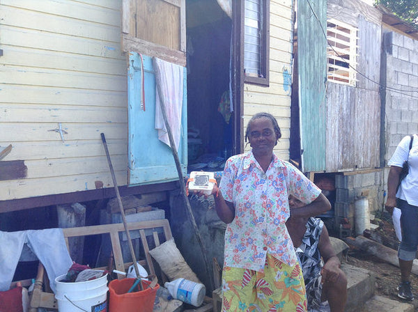 Recipient of LuminAID light in Dominica