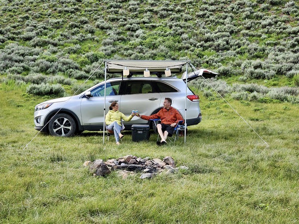 People and car at campsite Source: Lorena Brooks