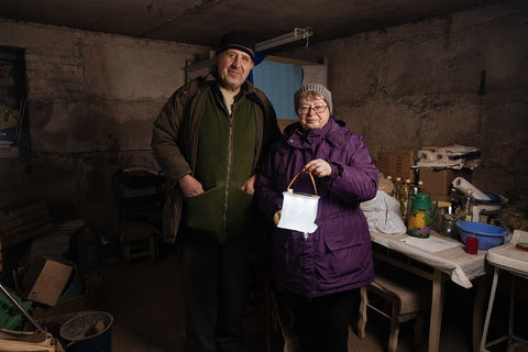 A couple in Ukraine with a LuminAID lantern - credit Sasha Leahovcenco / Mosaic