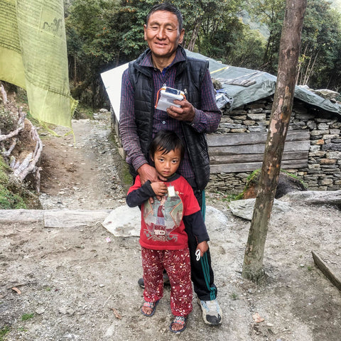 Father and son with their new lantern.