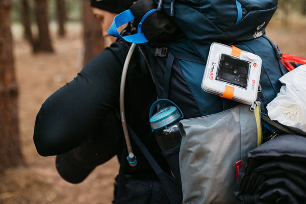 Person wearing a backpack with a water bottle in the side pocket. Source: Amanda Armstrong, @Amandaontherise