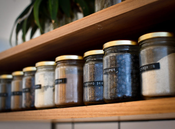 Spices labeled in a pantry. Source: Heather McKean via Unsplash