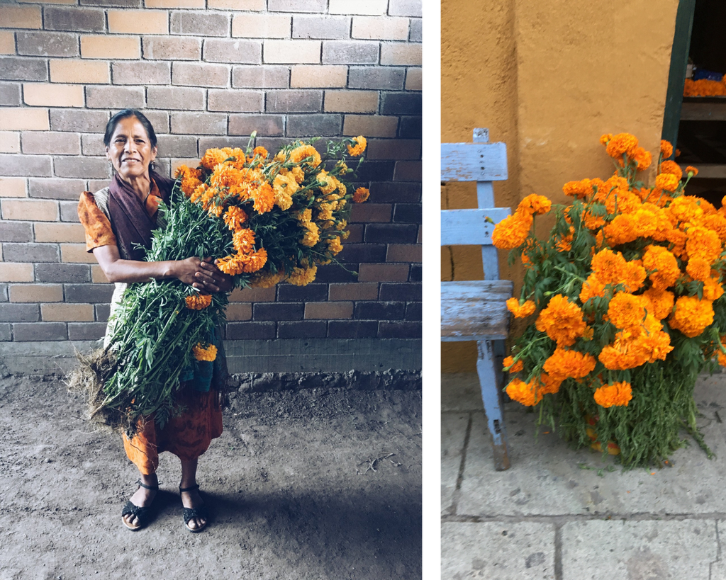 Zapotec artisan holding a bouquet of dried marigolds