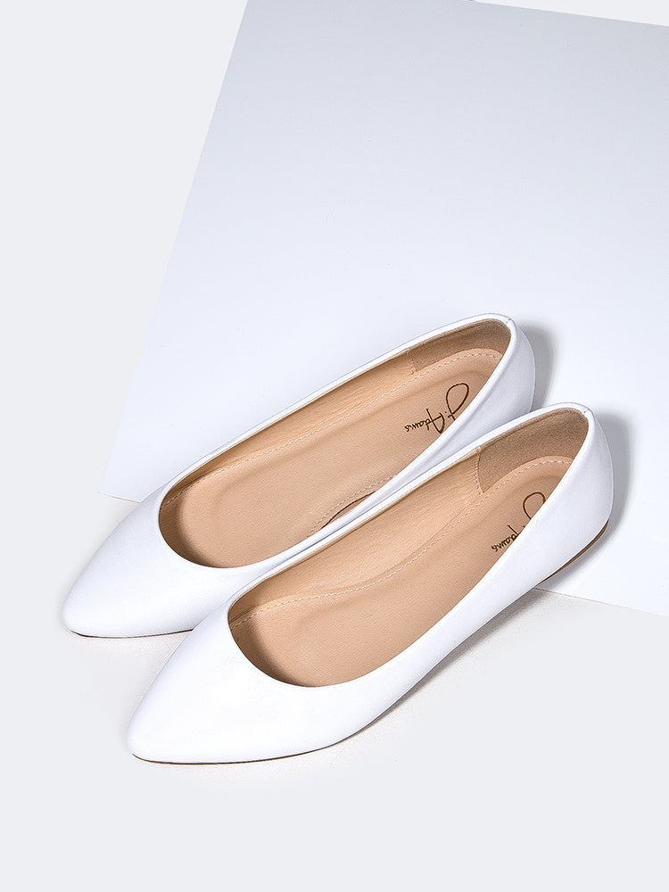 white pointed ballet flats