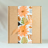 Orange floral gift wrapped box