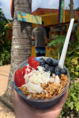 Blue dream bowl from sunrise shack on the North Shore of Oahu. Includes berries, granola, and blue spirulina powder