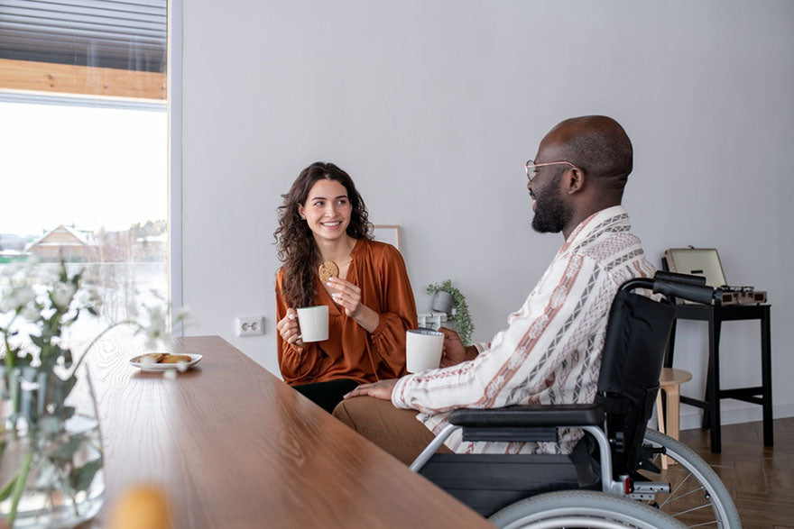 handicapped man at table