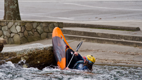 Splatting on the Nantahala in the Pyranha Kayak's Firecracker