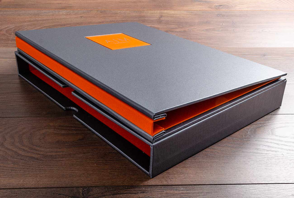 A3 photography portfolio in Petwer buckram and solo orange inner cover and spine cover and name plaque
