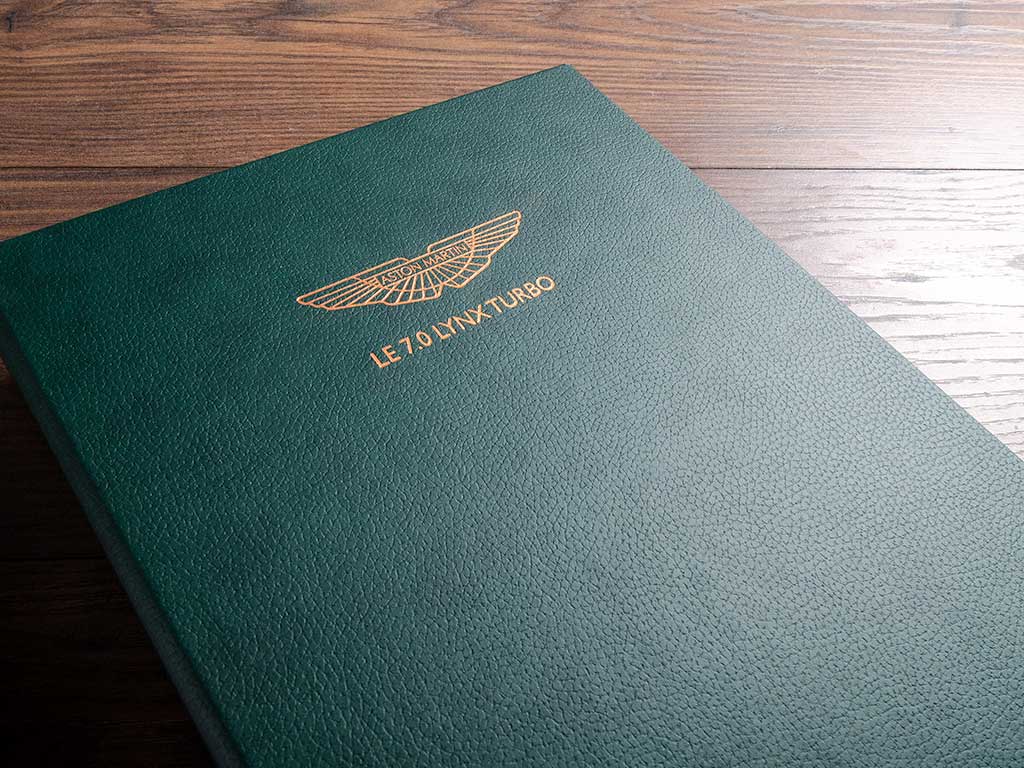 luxury car document and history folder in faux green leather with personalised cover
