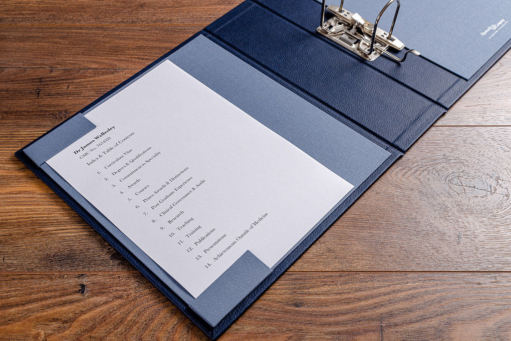 Contents page holder for a medical portfolio and surgical portfolio