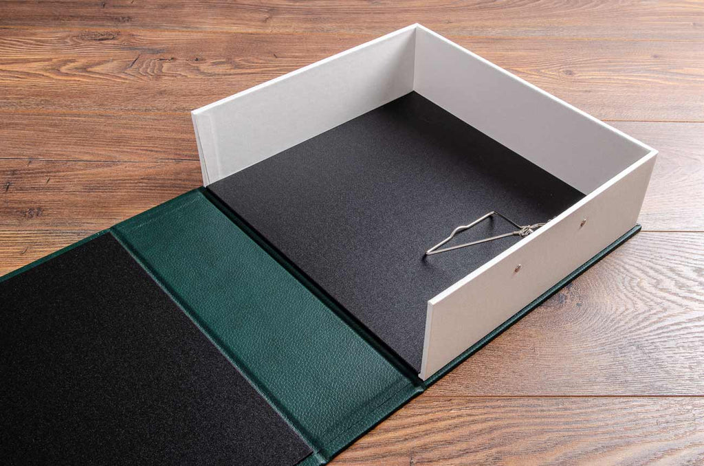 Bespoke A4 clamshell box file with spring clip mechanism for racing cars history and provenance