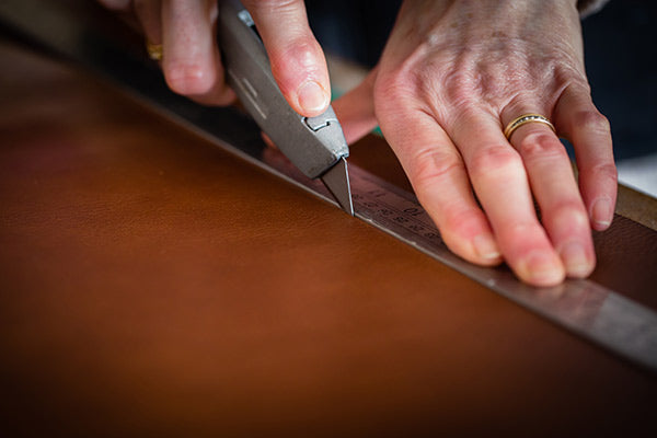 cutting out leather for a leather portfolio H&Co 600px